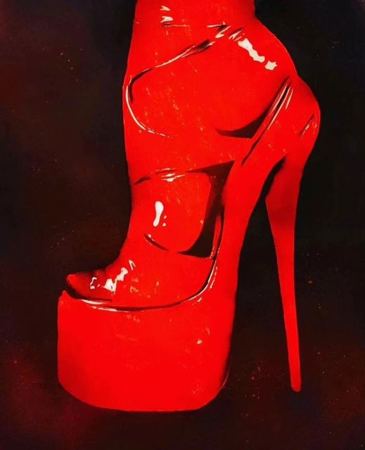 Close-up of a towering scarlet platform stiletto boot, rendered in vivid linocut and layered spray paint. The glossy red surface gleams against a deep black background, highlighting the bold curves and fetish-inspired silhouette. A powerful and provocative composition with striking contrast and sharp detail.
