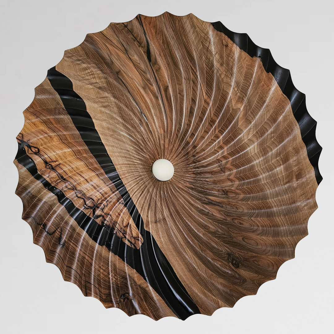 Round wood and resin wall sculpture with a central white core, radiating carved texture, and contrasting black resin inlay.