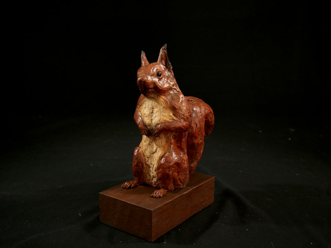 Cold cast iron sculpture of a red squirrel titled Chancekin by Jamie Lord — finely detailed woodland animal with russet red coat, cream chest, bushy tail and bright black eyes, poised in alert curiosity. Limited edition of 24 with signed Certificate of Authenticity.