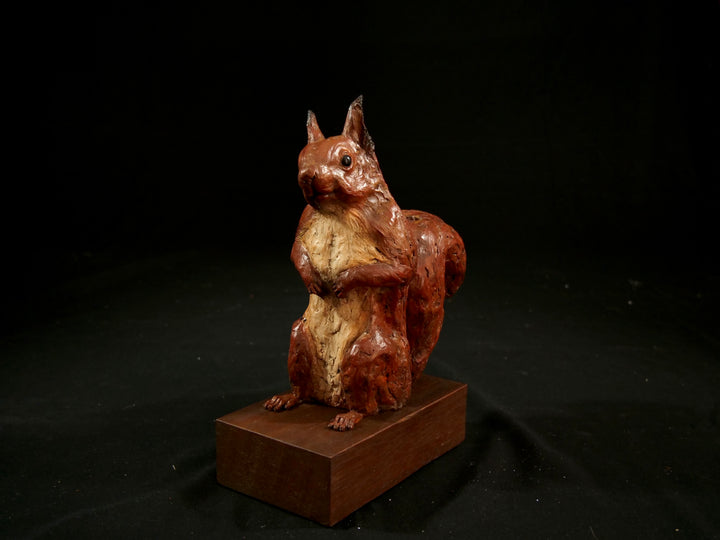 Cold cast iron sculpture of a red squirrel titled Chancekin by Jamie Lord — finely detailed woodland animal with russet red coat, cream chest, bushy tail and bright black eyes, poised in alert curiosity. Limited edition of 24 with signed Certificate of Authenticity.