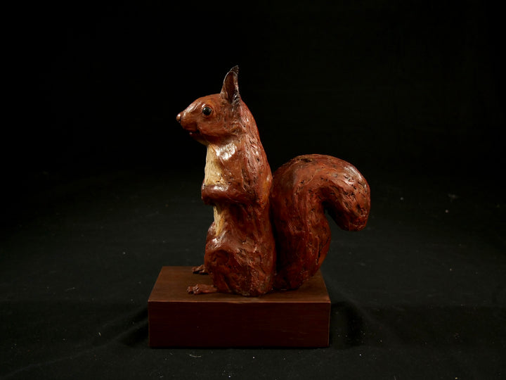 Cold cast iron sculpture of a red squirrel titled Chancekin by Jamie Lord — finely detailed woodland animal with russet red coat, cream chest, bushy tail and bright black eyes, poised in alert curiosity. Limited edition of 24 with signed Certificate of Authenticity.