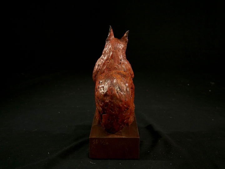 Cold cast iron sculpture of a red squirrel titled Chancekin by Jamie Lord — finely detailed woodland animal with russet red coat, cream chest, bushy tail and bright black eyes, poised in alert curiosity. Limited edition of 24 with signed Certificate of Authenticity.