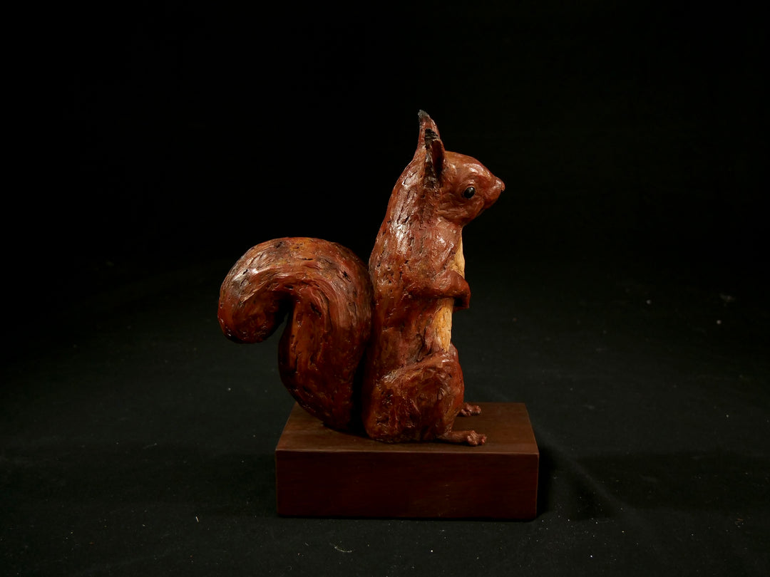 Cold cast iron sculpture of a red squirrel titled Chancekin by Jamie Lord — finely detailed woodland animal with russet red coat, cream chest, bushy tail and bright black eyes, poised in alert curiosity. Limited edition of 24 with signed Certificate of Authenticity.