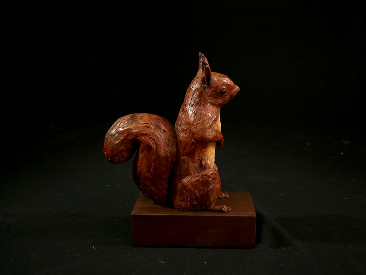 Cold cast iron sculpture of a red squirrel titled Chancekin by Jamie Lord — finely detailed woodland animal with russet red coat, cream chest, bushy tail and bright black eyes, poised in alert curiosity. Limited edition of 24 with signed Certificate of Authenticity.