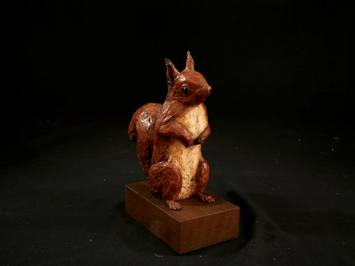 Cold cast iron sculpture of a red squirrel titled Chancekin by Jamie Lord — finely detailed woodland animal with russet red coat, cream chest, bushy tail and bright black eyes, poised in alert curiosity. Limited edition of 24 with signed Certificate of Authenticity.