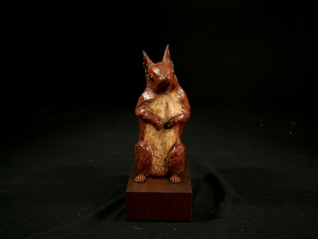 Cold cast iron sculpture of a red squirrel titled Chancekin by Jamie Lord — finely detailed woodland animal with russet red coat, cream chest, bushy tail and bright black eyes, poised in alert curiosity. Limited edition of 24 with signed Certificate of Authenticity.
