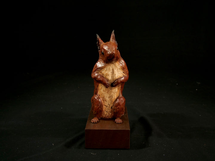 Cold cast iron sculpture of a red squirrel titled Chancekin by Jamie Lord — finely detailed woodland animal with russet red coat, cream chest, bushy tail and bright black eyes, poised in alert curiosity. Limited edition of 24 with signed Certificate of Authenticity.