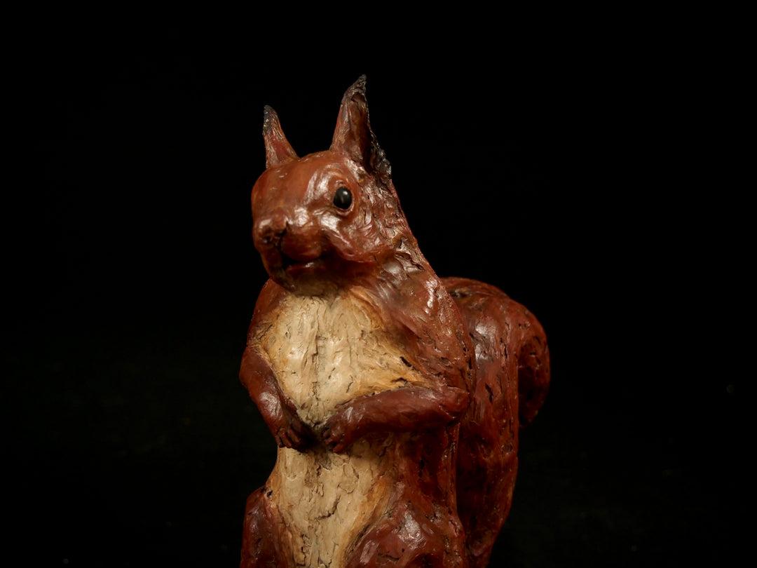 Cold cast iron sculpture of a red squirrel titled Chancekin by Jamie Lord — finely detailed woodland animal with russet red coat, cream chest, bushy tail and bright black eyes, poised in alert curiosity. Limited edition of 24 with signed Certificate of Authenticity.