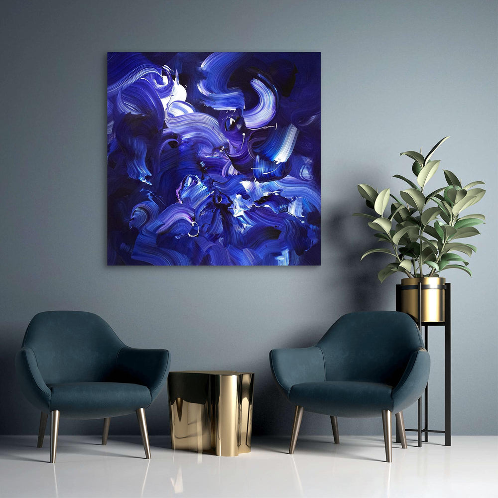 Expressive abstract painting featuring sweeping brushstrokes in deep indigo, cobalt blue, violet, and accents of white. The layered composition creates a sense of fluid motion, depth, and energy on a midnight-toned canvas.