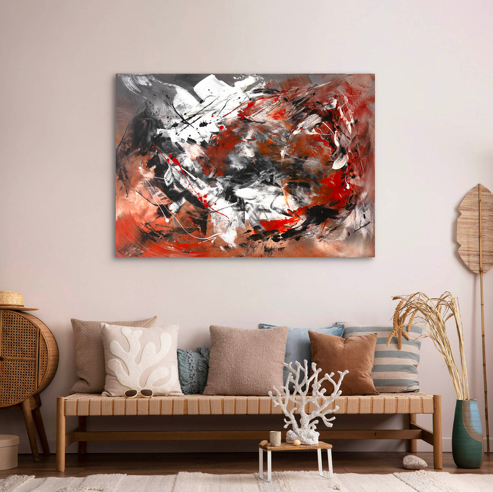 Abstract expressionist painting with dynamic brushstrokes in black, white, and deep red, layered over a burnt orange and grey-toned background. Energetic splashes and gestural marks create a powerful sense of motion and intensity.