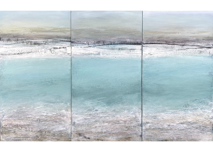 'Across The Bay, St Ives' by Heather McAlpine, an original large-scale triptych seascape painting in acrylic on canvas inspired by the panoramic beauty of St Ives Bay, Cornwall. Three connected panels depict pale turquoise waters, silvery shoreline and soft grey skies, capturing the shifting light, tide and tranquillity of the Cornish coast in an immersive contemporary composition.