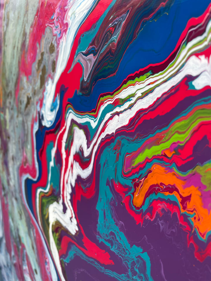 Large square abstract painting “United We Stand” by Swarez — a high-impact explosion of swirling magenta and deep blue blending with metallic gold, copper, turquoise, vivid orange, lime green, crisp white and rich black. Layers of glossy enamel paint radiate outward from the centre in fluid marbled streams, creating a dramatic, multi-directional composition full of energy and movement.