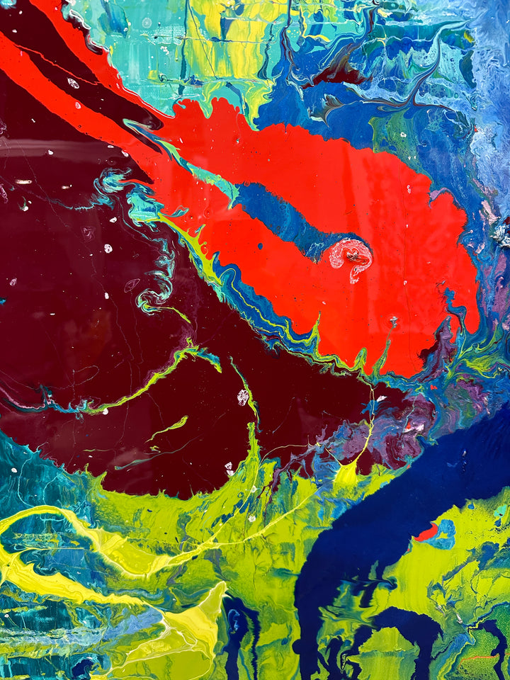 Large abstract painting “Infinite Light” by Swarez — vibrant sweeping strokes of scarlet red, fiery orange and deep burgundy layered over a luminous turquoise and lime green base, with accents of cobalt blue and black. Highly textured enamel surface with bold movement and glossy, light-catching details.