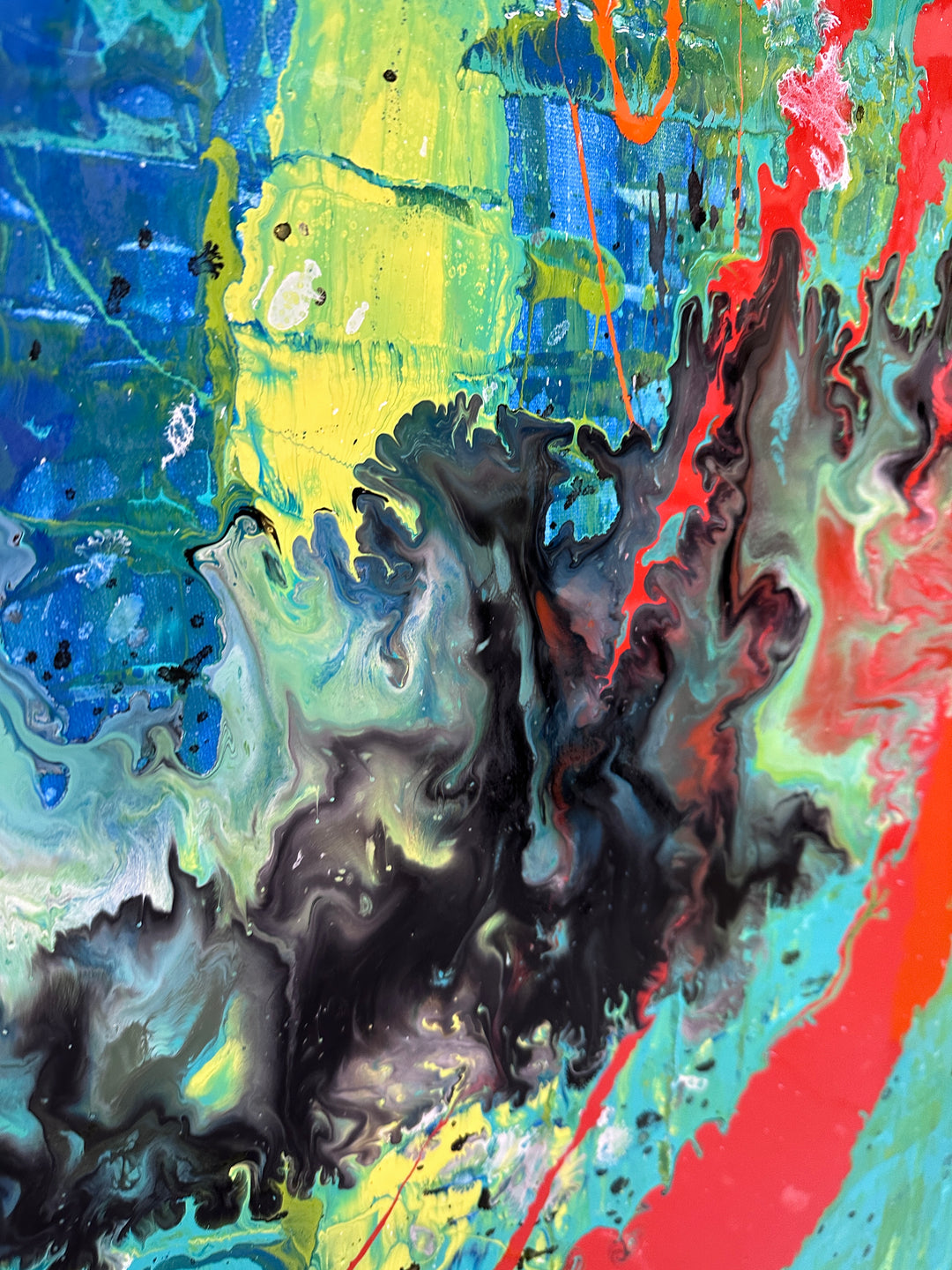 Large abstract painting “Infinite Light” by Swarez — vibrant sweeping strokes of scarlet red, fiery orange and deep burgundy layered over a luminous turquoise and lime green base, with accents of cobalt blue and black. Highly textured enamel surface with bold movement and glossy, light-catching details.