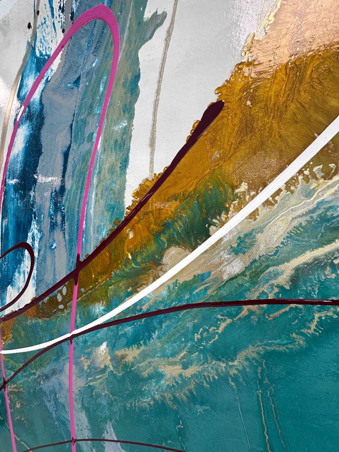Large abstract painting “Anthus” by Swarez — layered arcs and sweeping semi-circles created with poured enamel paint in deep teal, turquoise, navy blue, warm gold, taupe, light grey, ivory, and accents of vivid magenta and burgundy, finished with a high-gloss, fluid texture on canvas.