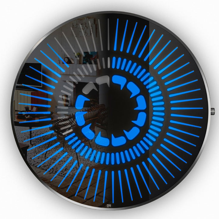 “Tempus Obsidian” by Ben Rousseau – a limited-edition illuminated wall timepiece crafted from grey mirrored glass and brass-tinted aluminium with LEDs. Inspired by obsidian, it radiates calm through subtle light and refined design.

