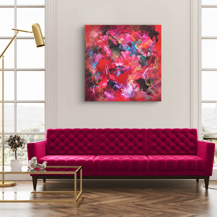 Energetic abstract painting dominated by vivid red, pink, and magenta tones with expressive brushstrokes, splashes of turquoise, black, and white on a dynamic, layered background.