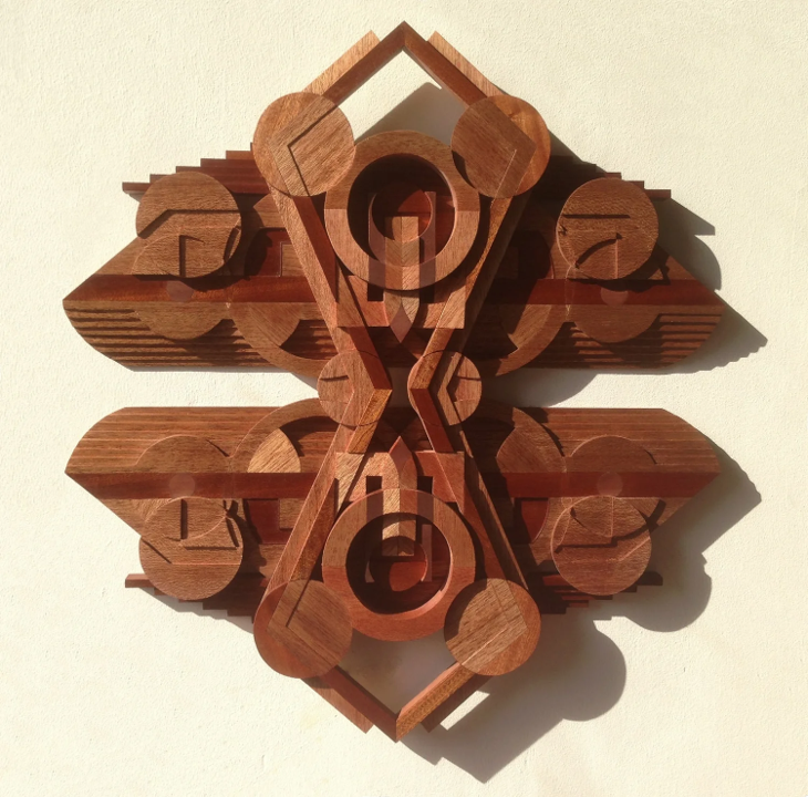 Hand-carved wooden wall sculpture by Richard Slee titled “Solar Differentials,” crafted from Meranti wood in a symmetrical, radial composition. Features geometric layering, concentric circles, and intersecting lines with warm red-brown natural wood tones.