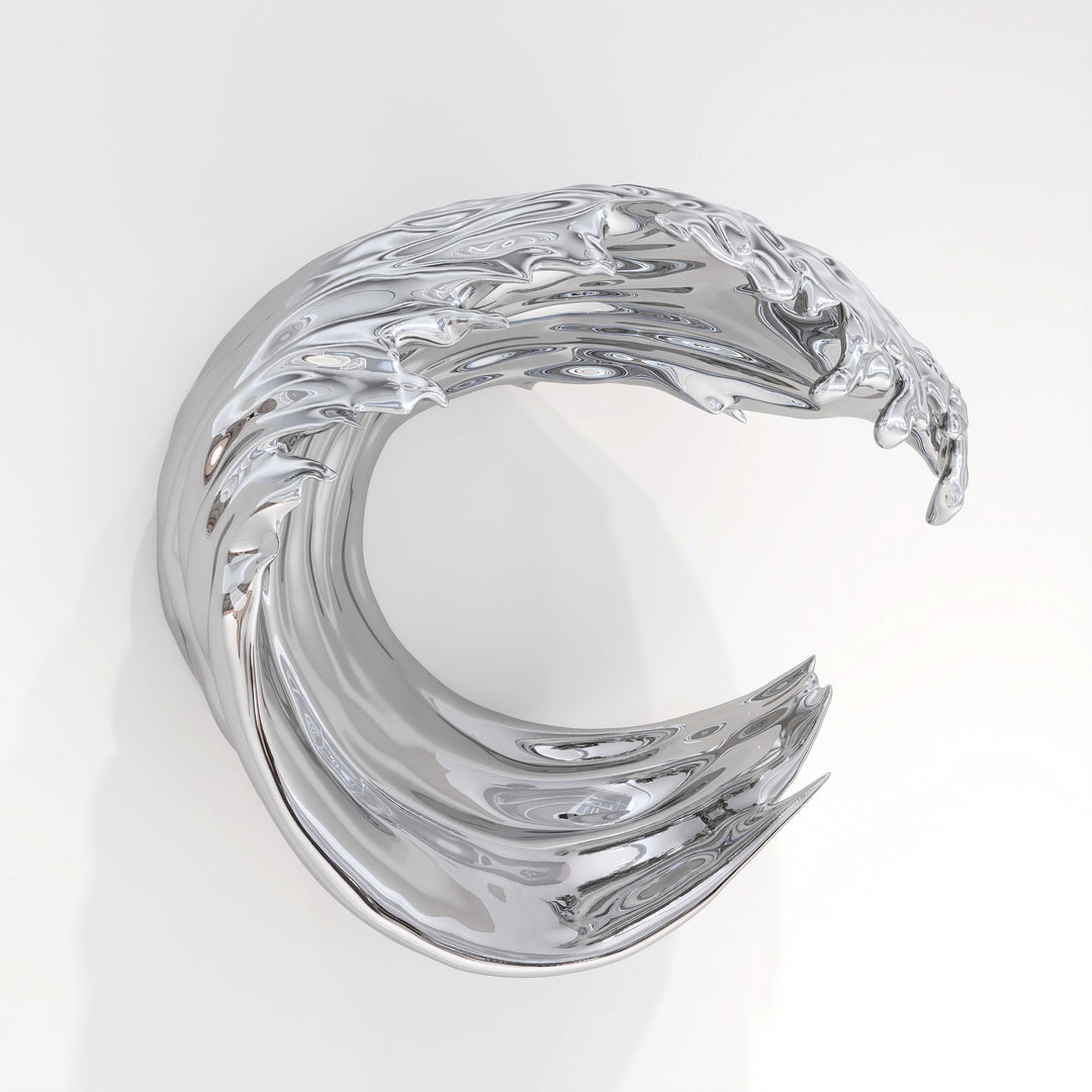 Striking wall-mounted sculpture by Yoni Alter, crafted from mirror-polished stainless steel and shaped into a stylised cresting wave. The reflective surface and sweeping fluid lines capture movement, energy, and elegance, blending natural inspiration with futuristic minimalism. Suitable for both interior and exterior display.