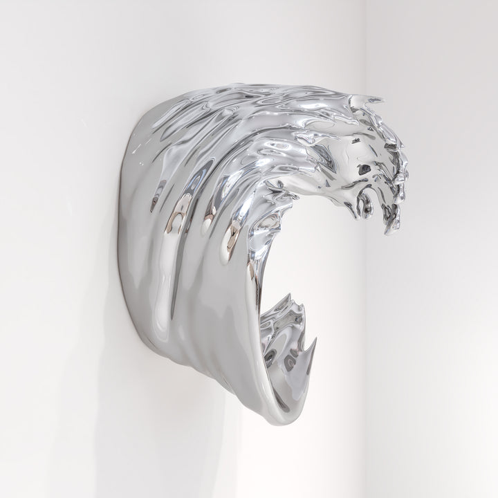 Striking wall-mounted sculpture by Yoni Alter, crafted from mirror-polished stainless steel and shaped into a stylised cresting wave. The reflective surface and sweeping fluid lines capture movement, energy, and elegance, blending natural inspiration with futuristic minimalism. Suitable for both interior and exterior display.