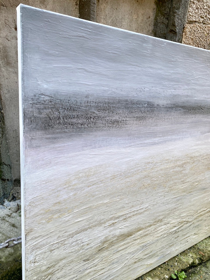 ‘Haar’ by Heather McAlpine, an original contemporary seascape painting in acrylic on canvas inspired by the atmospheric coastal sea mist of Scotland and Cornwall. Soft layers of muted grey, white, cream and pale earth tones dissolve the horizon, creating a tranquil and expansive meeting of sea, sky and shoreline.