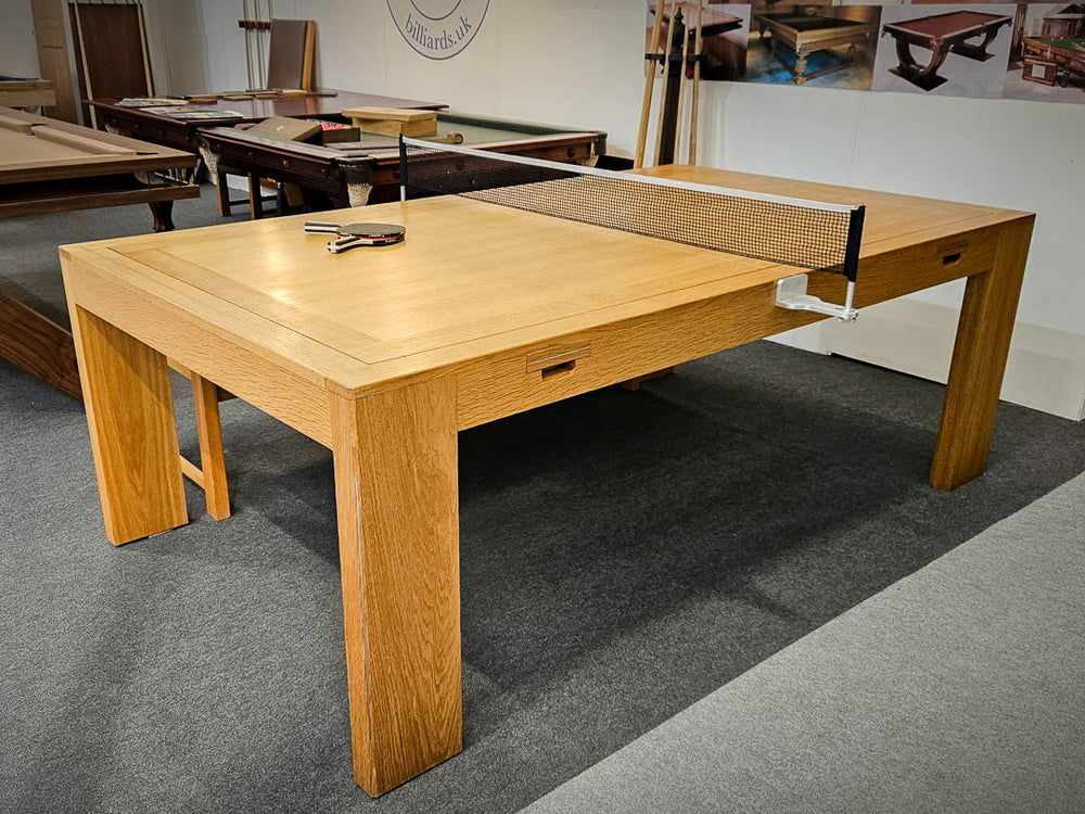 Sir William Bentley Billiards Speed Rollover 6ft dual-purpose pool table in solid oak with concealed playing surface and integrated dining design.