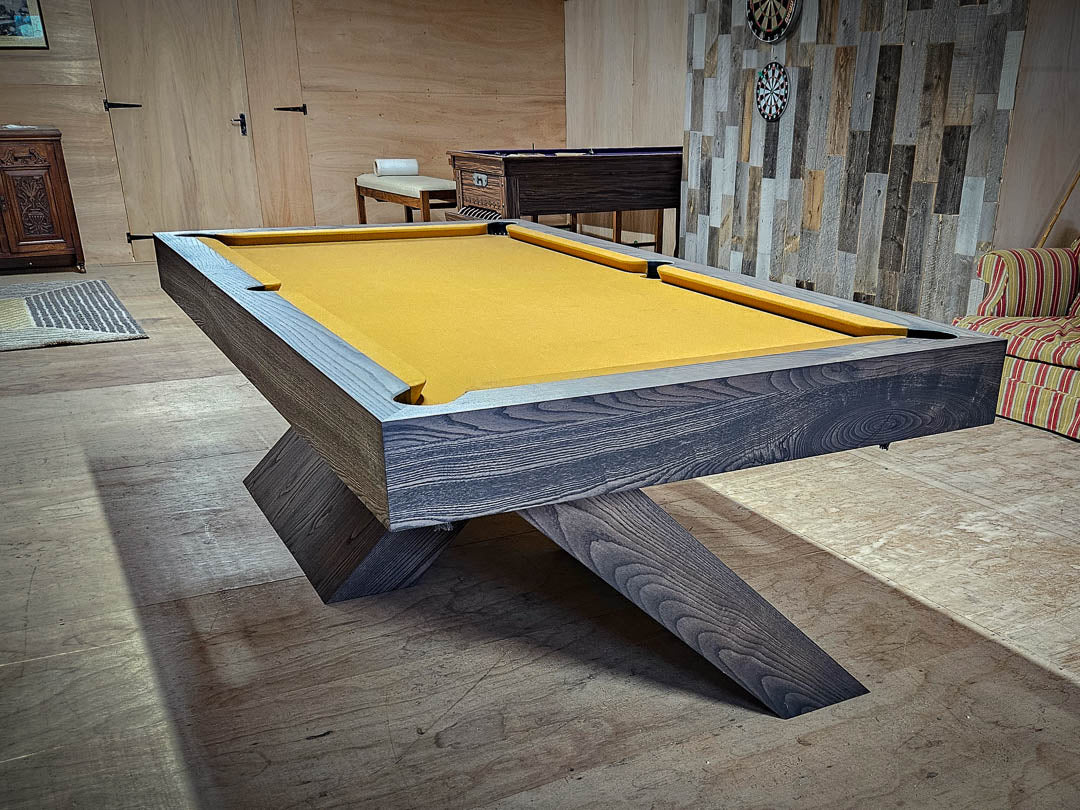 Sir William Bentley Billiards Cantilever 7ft pool table in grey ash with sculptural angled base and tan cloth, showcasing a bold architectural design.