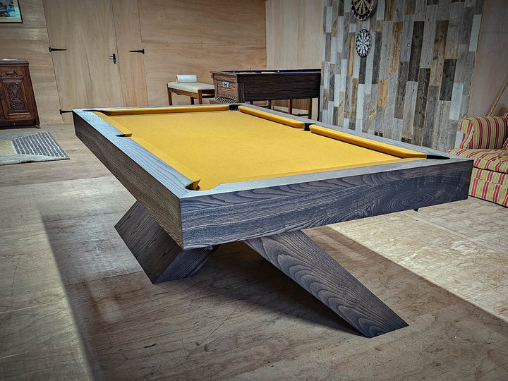 Sir William Bentley Billiards Cantilever 7ft pool table in grey ash with sculptural angled base and tan cloth, showcasing a bold architectural design.