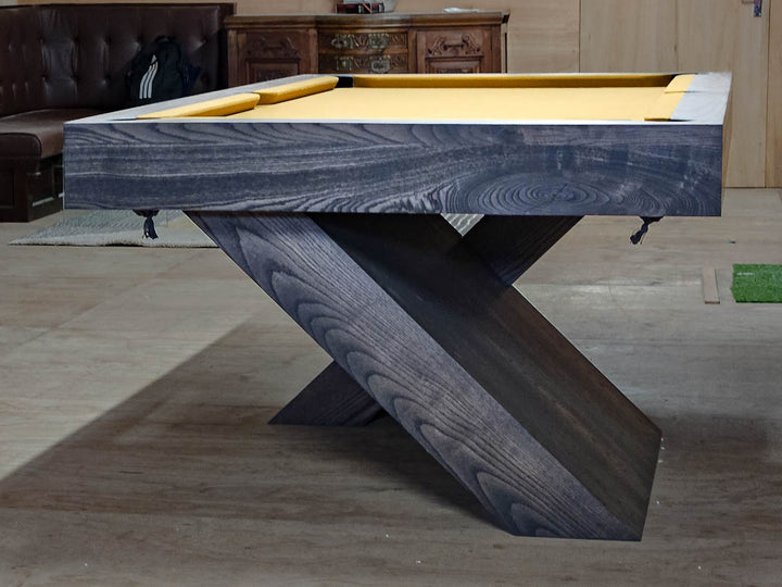 Sir William Bentley Billiards Cantilever 7ft pool table in grey ash with sculptural angled base and tan cloth, showcasing a bold architectural design.