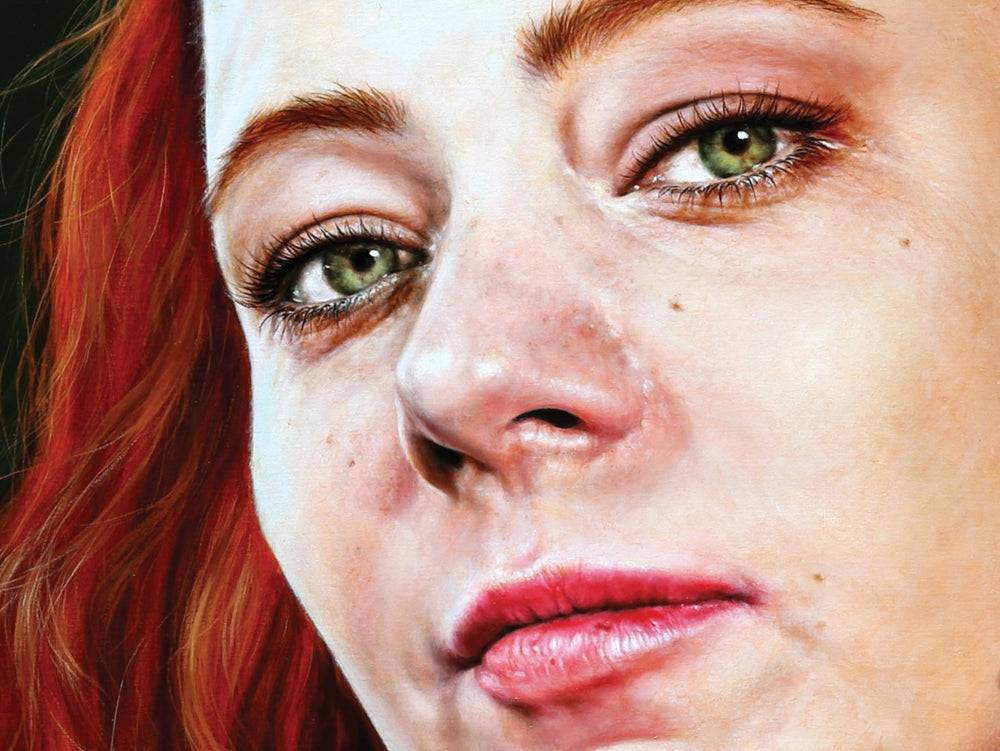 Arina Gordienko hyperrealist oil painting Full Moon, a dramatic portrait of a woman with flowing red hair, piercing green eyes, and ornate silver and black jewellery, inspired by Ortrud from Wagner’s opera Lohengrin. Set against a dark background, the figure radiates strength, mystery, and theatrical presence, blending classical opera with contemporary realism.