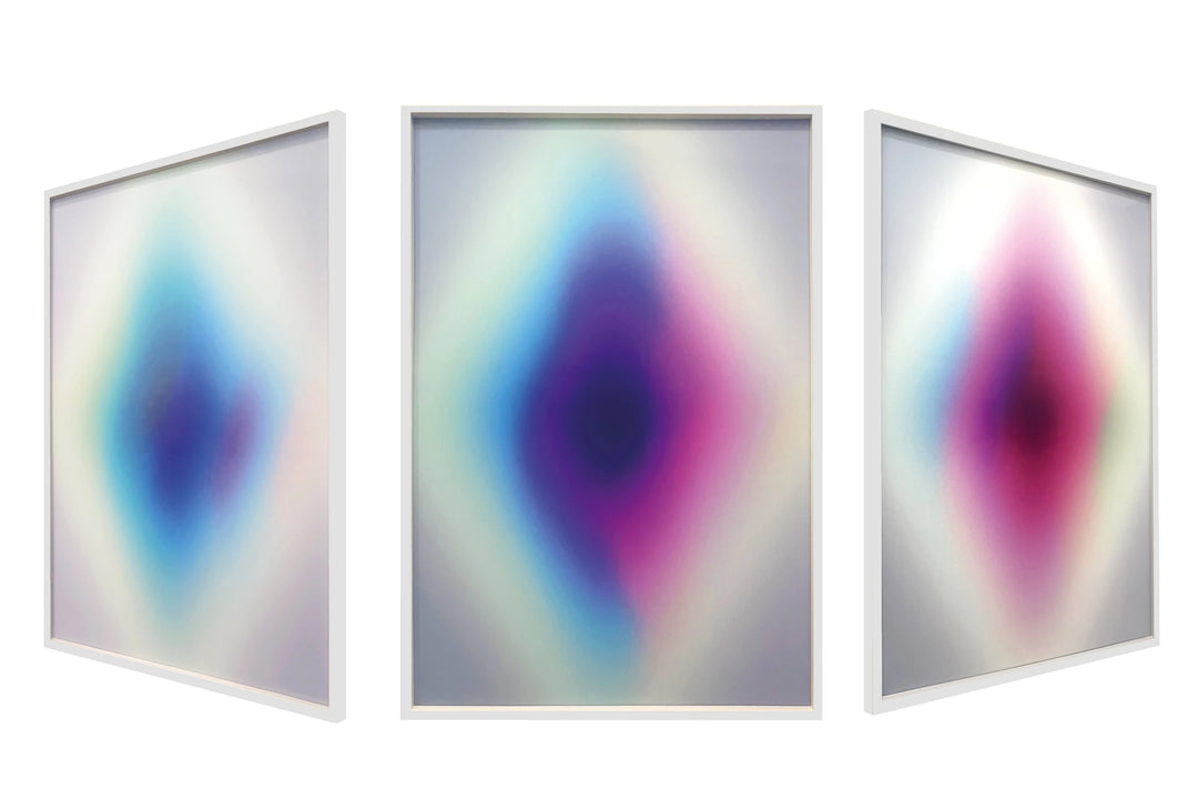 The Opening: Lenticular by Lauren Baker, a limited edition reflective lenticular artwork composed of four abstract paintings, creating shifting gradients of light and colour within a white wood box frame, offering a dynamic visual experience that changes with perspective.