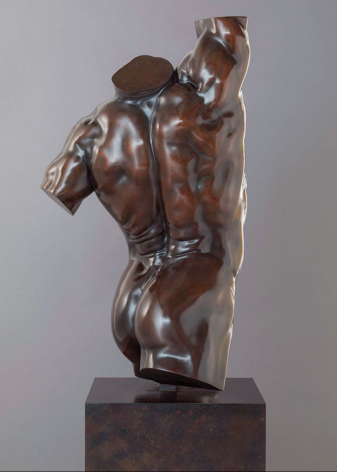 A powerful bronze torso sculpture by Nick Bibby, depicting Apollo with precise classical anatomy, a rich dark-bronze patina, and an upward twisting form displayed on a bronze plinth.