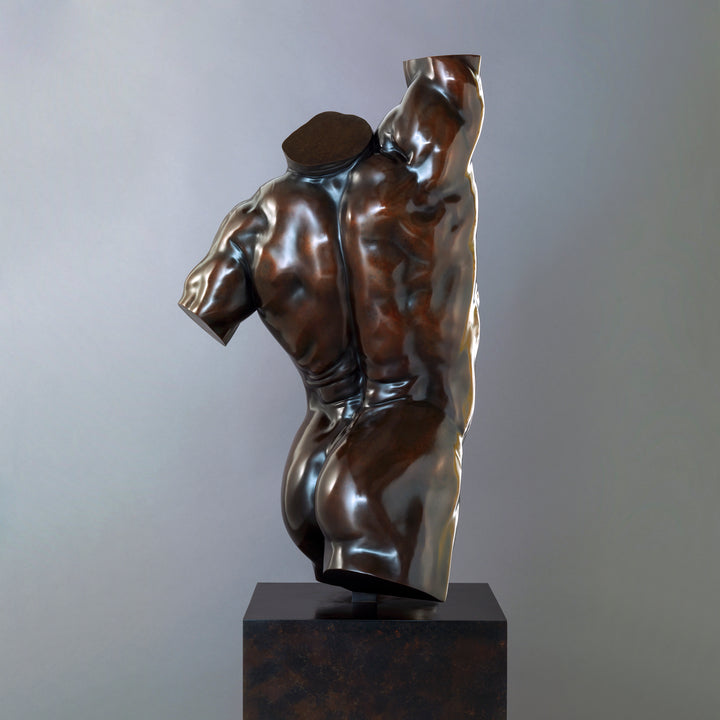A powerful bronze torso sculpture by Nick Bibby, depicting Apollo with precise classical anatomy, a rich dark-bronze patina, and an upward twisting form displayed on a bronze plinth.