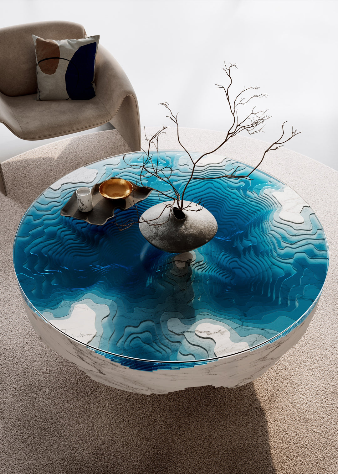 Duffy London Abyss Marble Horizon coffee table in white Carrara marble with layered blue glass, creating a sculptural ocean-depth illusion within a circular form.