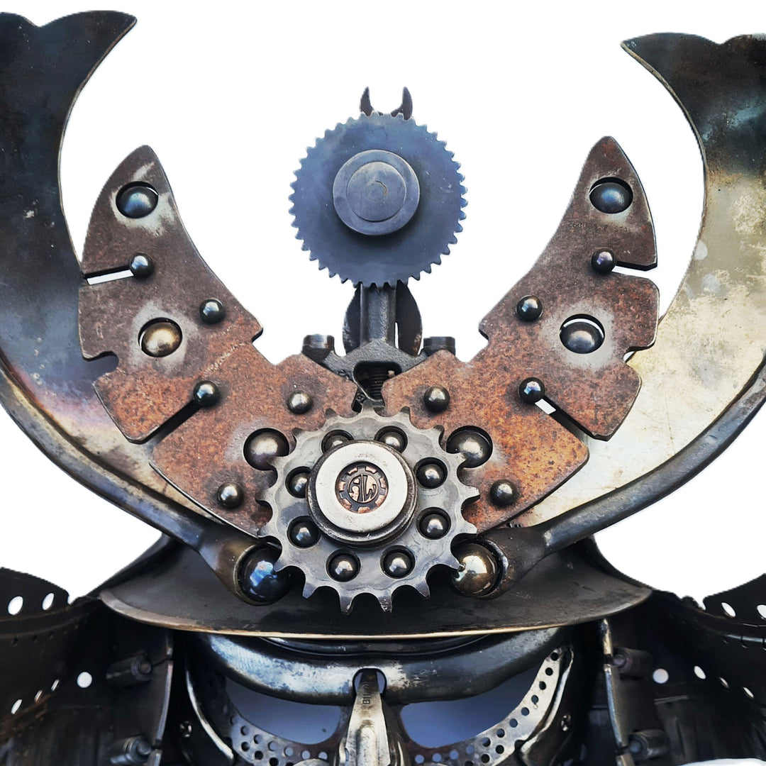 Samurai-inspired helmet sculpture crafted from reclaimed metal with intricate steampunk detailing.