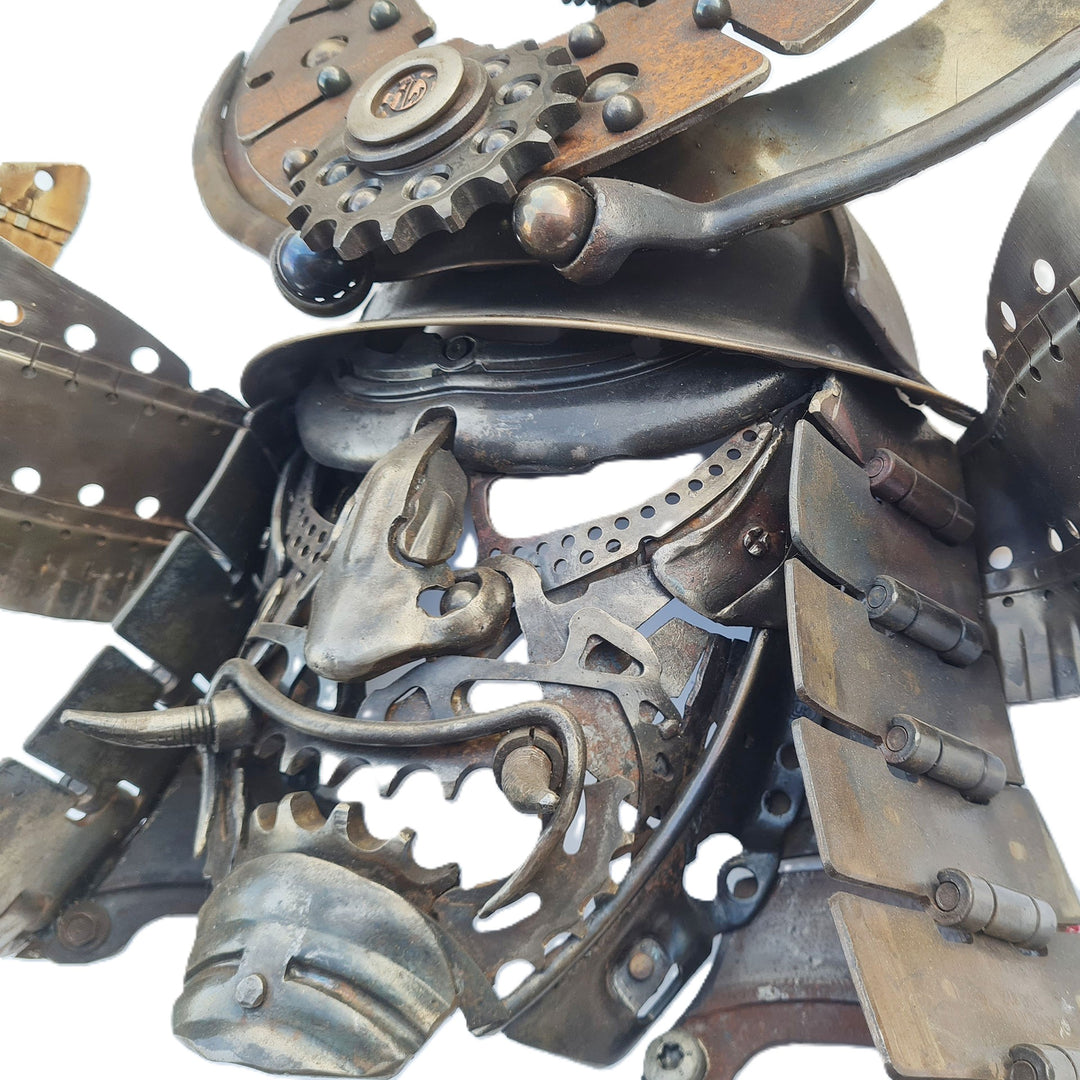 Samurai-inspired helmet sculpture crafted from reclaimed metal with intricate steampunk detailing.