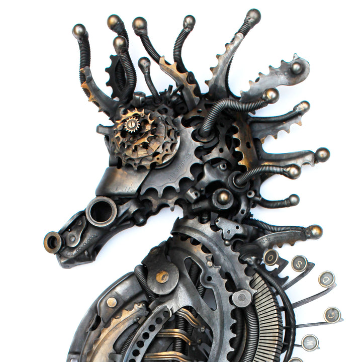 Steampunk-inspired seahorse sculpture made from reclaimed metal, gears, and intricate mechanical components.