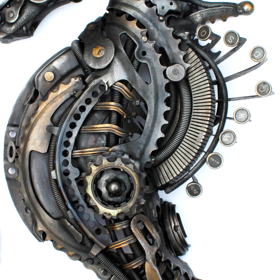Steampunk-inspired seahorse sculpture made from reclaimed metal, gears, and intricate mechanical components.