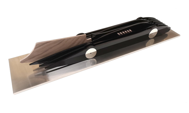 Limited-edition Bluebird V 1935 sculpture by Jonny Ambrose — layered black polished acrylic body with walnut tail-fin and polished nickel-plated aluminium details on a sleek white acrylic or brushed aluminium plinth, celebrating Malcolm Campbell’s 1935 land speed record at Bonneville Salt Flats.