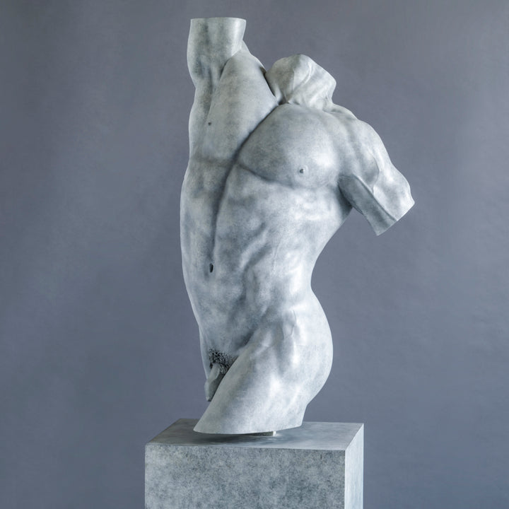 A powerful bronze torso sculpture by Nick Bibby, depicting Apollo with precise classical anatomy, a rich dark-bronze patina, and an upward twisting form displayed on a bronze plinth.