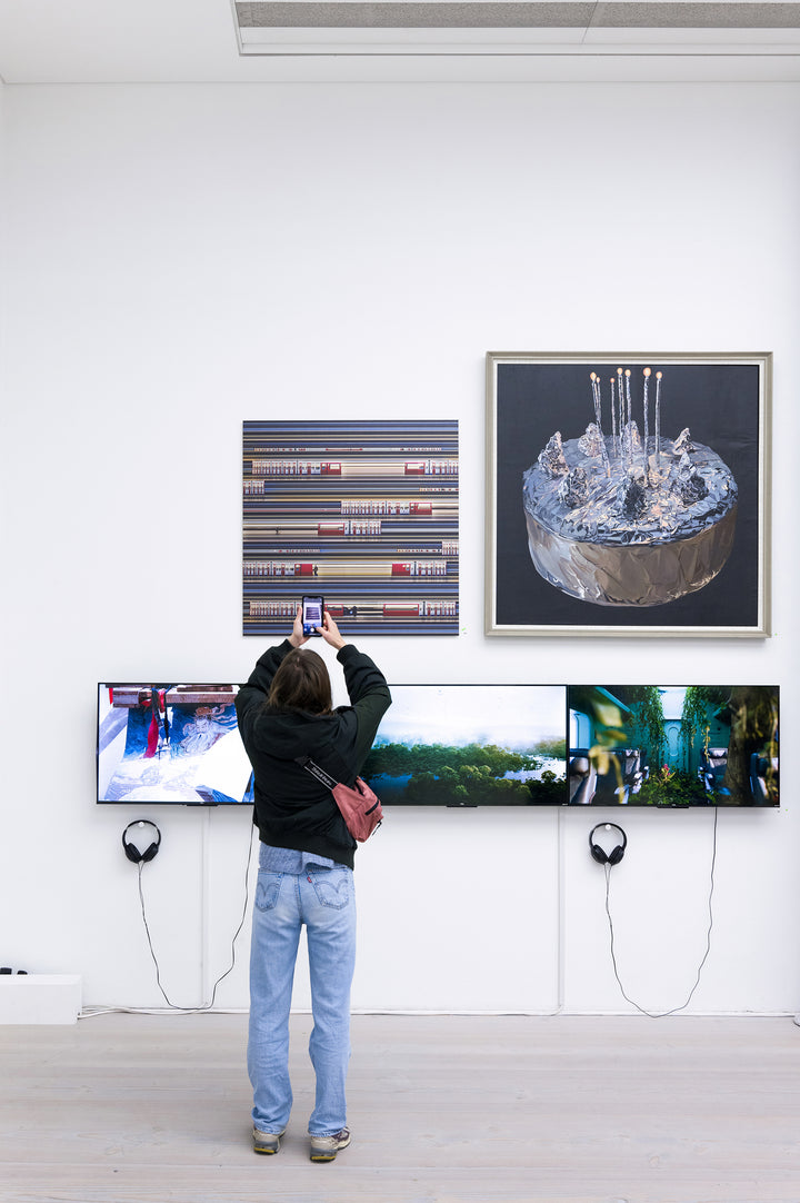 Richard P Jones District Line #2, London fine art photographic print showing layered London Underground District Line trains and commuters moving through a station platform, created from reconstructed high-speed video imagery and printed as a giclée on brushed aluminium.