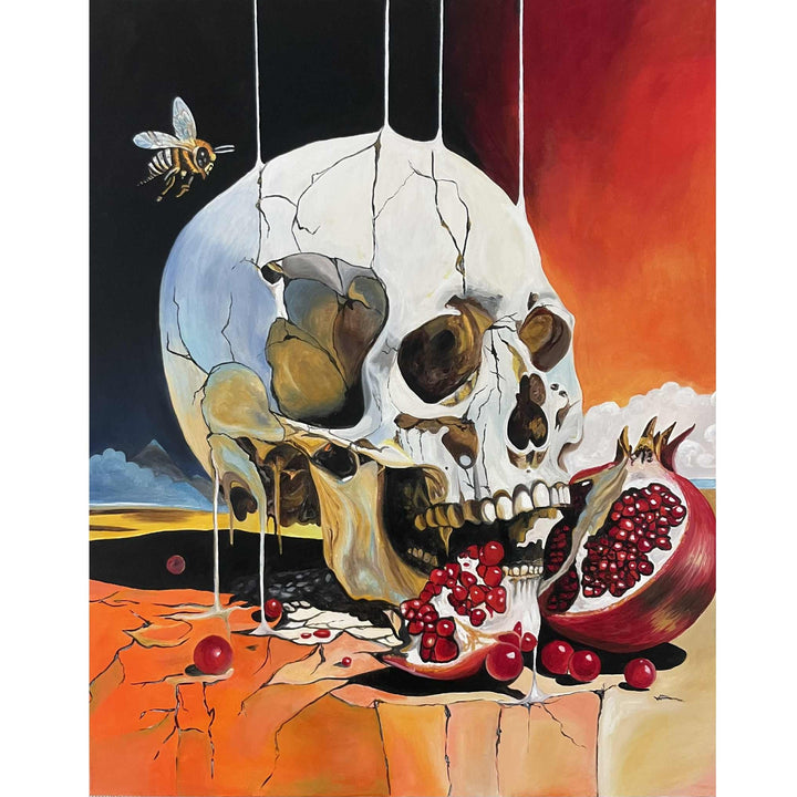 Victoria Saint The Awakening print of a cracked skull biting into a ripe pomegranate with vivid red seeds, set against a surreal landscape, exploring themes of desire, awareness and transformation.