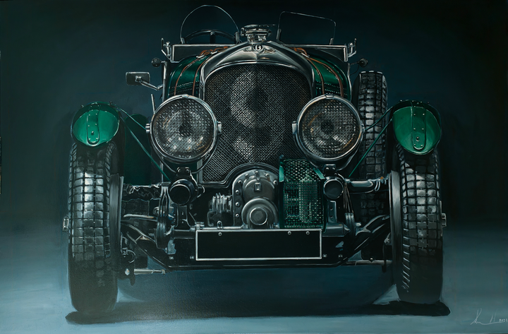 Hyperrealistic frontal portrait of a 1929 Bentley Blower racing car painted with striking precision. The deep British racing green body, polished chrome grille, and massive headlights dominate the dark backdrop, creating a monumental, almost living presence. Rich mechanical textures and metallic reflections celebrate engineering heritage and pre-war endurance racing glory.