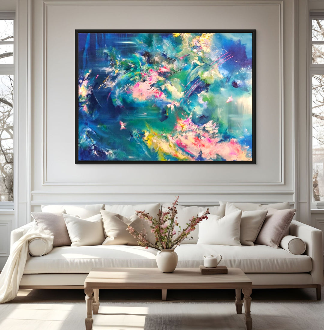 Abstract painting with rich teal, blue and pink tones, layered textures and fluid sweeping movement, framed in a black tray frame.
