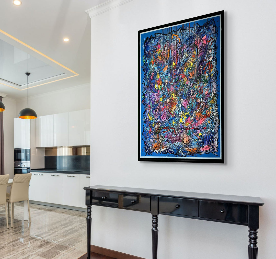 Vibrant abstract artwork in blue, pink and multicoloured layers with expressive graffiti lines, bold colour fields and energetic mark-making, filled with overlapping shapes, textures and movement.