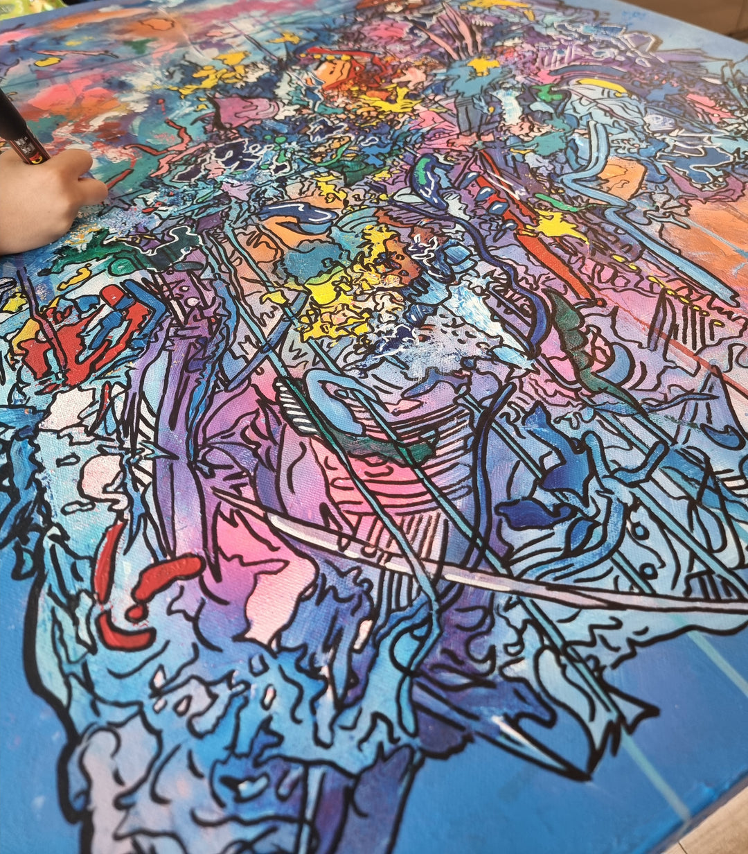 Vibrant abstract artwork in blue, pink and multicoloured layers with expressive graffiti lines, bold colour fields and energetic mark-making, filled with overlapping shapes, textures and movement.