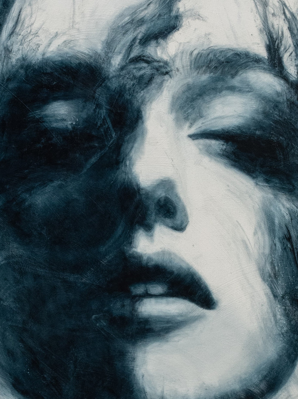 Large oil on canvas painting by Dan Bullock, titled Breathe. A monochrome portrait of a female face with eyes closed, emerging from swirling, smoky brushstrokes in deep teal and black against a pale background, balancing realism and abstraction.