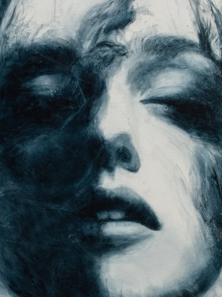 Large oil on canvas painting by Dan Bullock, titled Breathe. A monochrome portrait of a female face with eyes closed, emerging from swirling, smoky brushstrokes in deep teal and black against a pale background, balancing realism and abstraction.