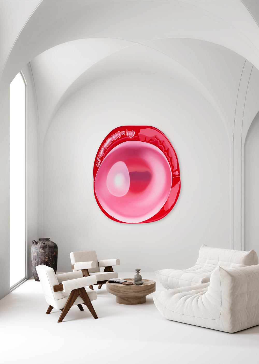 Glossy abstract red and pink circular form with soft gradients and reflective highlights on a white background.
