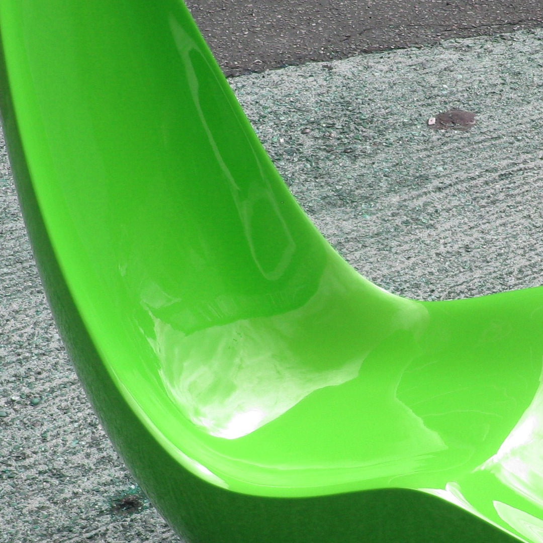 “Caillou Chaise – Metallic Wet Spray” by Ben Rousseau – a sculptural chaise inspired by 1960s grand tourers, hand-shaped in composite with a high-gloss metallic lacquered finish in white, lime, gold, or silver. A fusion of luxury design and form.
